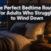 The Perfect Bedtime Routine for Adults Who Struggle to Wind Down Last updated: June 15, 2026 Quick Answer: A good bedtime routine for adults who struggle to sleep starts 30-60 minutes before bed and uses the same sequence of calming activities every night. The goal is not to force sleep - it is to signal to your nervous system that the threat is over and it is safe to rest. Consistency matters more than perfection. Key Takeaways A 30-60 minute wind-down window is the core structure recommended by sleep physicians and behavioral sleep specialists [4] Consistency in timing - same bedtime, same sequence - is more powerful than any single sleep hack Screens are not just a blue light problem; the content you consume (news, social media, work email) is equally disruptive to sleep onset People with anxiety need a slightly different approach - one that addresses racing thoughts directly, not just physical relaxation Supplements like low-dose melatonin and magnesium glycinate have some evidence behind them, but they work best alongside behavioral changes Night shift workers and people with irregular schedules can still build effective routines - they just need to anchor them to their sleep time, not the clock Most common mistake: lying in bed awake trying to fall asleep, which trains your brain to associate bed with wakefulness You don't have to fall asleep - you just have to rest. That reframe alone reduces sleep anxiety significantly What Is a Good Bedtime Routine That Actually Helps Adults Fall Asleep Faster A good bedtime routine for adults is a repeatable sequence of low-stimulation activities done in the 30-60 minutes before sleep, at roughly the same time each night. The Sleep Foundation describes it as a set of predictable actions that cue your brain sleep is coming [4]. It works because your nervous system responds to patterns - not commands. Here's what the research actually says: you cannot force sleep. What you can do is lower your physiological arousal enough that sleep becomes likely. That is the whole job of a wind-down routine. A simple structure that works for most people: 10 minutes - light tidying or preparing for tomorrow (reduces mental load) 10 minutes - bathroom hygiene, skincare, whatever signals "day is done" 10-20 minutes - gentle stretching or body scan 15-20 minutes - reading a physical book or listening to calm audio Sleep coaches and clinicians have been popularizing both 30-minute and 60-minute versions of this structure in 2025-2026, specifically because anxious sleepers do better with concrete timing rather than vague advice to "relax before bed" [1]. The honest version is: the specific activities matter less than the consistency. If you do the same things in the same order every night, your body starts anticipating sleep before you even get into bed. How Long Should a Bedtime Routine Actually Take For most adults, 30-60 minutes is the target. Sleep physicians interviewed by NPR in early 2026 specifically recommended a protected wind-down window of this length, devoted only to calming, predictable activities [4]. If you are severely overstimulated at night - high-stress job, anxiety, or a history of insomnia - 60 minutes is more realistic than 30. If your schedule is tight, even 20 minutes of consistent, low-stimulation activity beats nothing. The key word is protected. That window is not for checking one last email, scrolling for five minutes, or finishing a work task. Those things restart your stress response right when you need it to be winding down. Best Ways to Relax Before Bed Without Screens The most effective screen-free wind-down activities are reading physical books, gentle yoga or stretching, journaling, listening to calm audio (podcasts, audiobooks, ambient sound), and taking a warm bath or shower. A warm bath or shower about 90 minutes before bed has decent research behind it. The drop in body temperature that follows mimics the natural temperature drop your body uses to initiate sleep. It is one of the more underrated tools in a bedtime routine for adults. Other options worth trying: Progressive muscle relaxation - tensing and releasing muscle groups from feet to face Light journaling - not processing your whole day, just writing a short "done list" and a brief plan for tomorrow to offload mental loops Stretching - even 10 minutes of slow, floor-based stretching significantly reduces physical tension Herbal tea - chamomile, passionflower, and lemon balm have mild calming effects; the ritual itself is part of the benefit I keep a paperback on my nightstand specifically for this. Not because reading is magic, but because it gives my brain something absorbing that is not a screen and not my own anxious thoughts. That is the actual mechanism - displacement, not sedation. What Should You Avoid Doing Right Before Sleep Several common evening habits actively delay sleep onset, and most people who struggle with sleep are doing at least two or three of them without realizing it. Avoid these in the 60-90 minutes before bed: Checking work email or anything requiring a decision Watching stimulating content (thrillers, news, anything emotionally activating) Eating a large meal or anything high in sugar Alcohol - it may help you fall asleep faster but it fragments sleep in the second half of the night [6] Intense exercise (more on this below) Bright overhead lighting - switch to lamps or warm-toned bulbs after 9pm Cleveland Clinic specifically recommends keeping phones, tablets, and laptops out of the bedroom entirely and using the bed only for sleep and sex [9]. The reasoning is behavioral: if you use your bed for work, scrolling, or watching TV, your brain stops associating it with sleep. That association is harder to rebuild than most people expect. Sleepstation, a UK-based digital CBT-I provider, advises stopping all electronic devices at least two hours before bed for people who genuinely struggle to wind down [5]. That feels extreme until you try it for two weeks and notice the difference. Is It Bad to Exercise Right Before Bed For most people, vigorous exercise within 60-90 minutes of bedtime raises core body temperature and cortisol, both of which delay sleep onset. That said, light movement - walking, stretching, gentle yoga - is fine and often helpful. If your only available exercise window is evening, do not give it up entirely. The long-term sleep benefits of regular exercise outweigh the short-term disruption of late workouts for most people. Just try to finish anything intense at least 90 minutes before your target sleep time, and build a proper cool-down into your bedtime routine for adults. Worth trying if you are a late exerciser: a 10-minute cool-down walk followed by a warm shower. It accelerates the body temperature drop that signals sleep readiness. Bedtime Routine Differences for People With Anxiety If anxiety is driving your sleep problems, a standard wind-down routine is not quite enough on its own. The issue is not just stimulation - it is an overactive threat-detection system that does not switch off when the lights go out. For anxious sleepers, the routine needs to include something that directly addresses racing thoughts, not just physical relaxation. Insomnia and overthinking are closely linked, and ignoring the cognitive side of the problem is why most basic sleep hygiene advice fails this group. What works better for anxiety-driven insomnia: Scheduled worry time - 15 minutes earlier in the evening to write down worries and possible next steps, then close the notebook. The goal is to contain the worry, not eliminate it. Cognitive shuffle - a technique where you imagine random, unconnected images in sequence to interrupt the narrative thinking that keeps you awake Body scan meditation - shifting attention to physical sensations rather than thoughts (more on this below) Stimulus control - if you are lying awake for more than 20 minutes, get up and do something calm in dim light until you feel sleepy If you've been dealing with this for a while, it is worth evaluating whether what you are experiencing goes beyond normal sleep difficulty. If you recognize yourself in any of this - the racing thoughts, the dread of bedtime, the exhaustion that does not lead to sleep - consider taking this free anonymous insomnia test. It takes a few minutes and evaluates how you have been feeling over the past two weeks. It is not a diagnosis, but it can help clarify whether what you are dealing with needs more targeted support. Meditation Techniques to Calm Your Mind Before Bed Simple meditation works for sleep because it interrupts the rumination cycle - the loop of thoughts that keeps your nervous system activated. You do not need an app or experience. You need a technique you will actually use. Three that have the most practical evidence for sleep: 4-7-8 breathing - inhale for 4 counts, hold for 7, exhale for 8. The extended exhale activates the parasympathetic nervous system. Do 4 cycles. Body scan - starting at your feet, slowly move attention up through your body, noticing sensation without trying to change anything. It is boring by design. That is the point. Cognitive shuffle - developed by sleep researcher Luc Beaulieu-Prévost, this involves imagining a random word and then picturing unrelated images for each letter. It interrupts linear thinking, which is what keeps anxious minds awake. This is what worked for me: body scan, but only after I had done a short journaling session. Without offloading the day's mental residue first, I would just lie there narrating my worries instead of scanning my body. Sequence matters. What Supplements Actually Help With Sleep Quality Low-dose melatonin (0.5-3mg) and magnesium glycinate are the two supplements with the most consistent evidence for sleep, and both are relatively low-risk. Everything else requires more scrutiny. Melatonin - most useful for shifting sleep timing (jet lag, shift work, delayed sleep phase) rather than treating insomnia itself. The common mistake is taking too much - doses above 5mg are rarely more effective and can cause next-day grogginess [6]. Magnesium glycinate - some evidence for reducing sleep onset time and improving sleep quality, particularly in people who are deficient (which is more common than most people realize). The glycinate form is gentler on digestion than magnesium oxide. Ashwagandha - has some emerging evidence for reducing cortisol and improving sleep quality in stressed adults, but the research is less consistent. L-theanine - an amino acid found in green tea; may reduce anxiety and improve sleep quality at doses of 200-400mg. Generally well-tolerated. Medical disclaimer: Supplements can interact with medications and are not regulated the same way as pharmaceuticals. Talk to your doctor before starting anything new, especially if you take prescription medications. Worth trying if you want a starting point: magnesium glycinate (200-400mg) about an hour before bed. It is inexpensive, widely available, and has a reasonable evidence base. Why Do You Keep Waking Up in the Middle of the Night Waking up in the middle of the night is different from struggling to fall asleep, and the causes are often different too. Common drivers include: alcohol consumption in the evening, sleep apnea, blood sugar fluctuations, room temperature being too warm, and - especially in people with anxiety - conditioned arousal where the brain has learned to partially wake at certain times. If this is a persistent problem for you, these tips for sleeping through the night go deeper into the specific causes and fixes. The short version: alcohol is the most underestimated culprit, and keeping your bedroom cooler (around 65-68°F / 18-20°C) helps more than most people expect. The other thing worth knowing: waking briefly during the night is biologically normal. You have multiple sleep cycles per night, and light waking between them is common. The problem is when you cannot get back to sleep - which is usually a sign that your arousal threshold is too high, not that something is medically wrong. How to Build a Bedtime Routine If You Have an Irregular Work Schedule Night shift workers and people with variable schedules can still build an effective bedtime routine - they just need to anchor it to their sleep time, not the clock on the wall. The principle is the same: a consistent pre-sleep sequence that signals your brain sleep is coming. The difference is that "bedtime" might be 7am on some days and 11pm on others. That is genuinely harder, and it is not just you - shift work is one of the most disruptive things you can do to your circadian rhythm. Practical adjustments: Use blackout curtains and a sleep mask if sleeping during daylight hours Keep your pre-sleep routine identical regardless of what time it is Avoid bright light exposure in the 90 minutes before your target sleep time If possible, try to keep your sleep window consistent even on days off - large swings in sleep timing (social jet lag) undo a lot of the progress from a good routine [4] For people with truly erratic schedules, understanding why you can't sleep even when you're tired can help identify whether the issue is circadian disruption, sleep pressure, or something else. Common Mistakes That Ruin Your Sleep Routine Most people who struggle with sleep are not failing because they lack willpower. They are failing because they are making a few specific structural errors that undermine everything else. The biggest mistakes: Trying too hard to fall asleep - the effort itself raises arousal. Sleep is not something you do; it is something that happens when you stop interfering. Inconsistent wake times - sleeping in on weekends feels restorative but it shifts your circadian rhythm and makes Monday night harder [4] Using the bed for wakefulness - working, scrolling, or watching TV in bed trains your brain to be alert there [9] Giving up on a routine after one bad night - it takes 2-3 weeks of consistency before a new routine starts to produce reliable results Over-relying on supplements or alcohol - both can mask the underlying issue while making it worse over time If you have been doing everything "right" and still not sleeping, the problem might not be your routine - it might be an underlying issue driving the insomnia. Understanding why you have insomnia is sometimes the missing step. Cheap vs Expensive Sleep Aids: What Actually Works The honest version is that most expensive sleep aids do not outperform cheap ones. The most evidence-backed interventions for sleep are also free or nearly free: consistent sleep timing, a dark cool room, and a simple wind-down routine. Tool Cost Evidence Level Notes Consistent sleep/wake times Free Strong Most impactful single change Blackout curtains $20-60 Good Especially useful for shift workers White noise machine $30-80 Moderate Helpful if noise is a trigger Magnesium glycinate $15-25/month Moderate Worth trying for 4 weeks Melatonin (low dose) $10-15/month Moderate for timing Less useful for maintenance insomnia Sleep tracking devices $200-400 Variable Can increase sleep anxiety in some people CBT-I (online programs) $50-200 Very strong Best evidence-based treatment for insomnia CBT-I (Cognitive Behavioral Therapy for Insomnia) consistently outperforms sleep medication in long-term studies and is now recommended as the first-line treatment by most sleep medicine organizations. If you have not tried it, it is worth serious consideration - especially if you have been dealing with insomnia for more than a few months. Building Your Bedtime Routine for Adults: A Practical Starting Point You do not need a perfect routine. You need a consistent one. Start with 30 minutes, pick three or four activities that feel manageable, and do them in the same order at the same time for two weeks before judging whether it works. A simple starting template: 30-minute version: 10 min: dim lights, make herbal tea, light tidy 10 min: bathroom routine + change into sleep clothes 10 min: read a physical book in bed (or body scan) 60-minute version: 15 min: journal + write tomorrow's short task list 10 min: gentle stretching 10 min: bathroom routine 25 min: read or listen to calm audio in low light For more specific techniques on falling asleep faster once you are in bed, these methods for falling asleep fast cover what actually works beyond the routine itself. It's not just you if this feels harder than it should. Building a sleep routine as an adult - especially when you have been sleeping badly for months or years - is not a simple habit change. It is retraining a nervous system that has learned to be vigilant at night. That takes time and patience, not just a better checklist. If you are still unsure whether what you are experiencing is standard sleep difficulty or something that needs more support, take this free anonymous insomnia test. It evaluates how you have been feeling over the past two weeks and can help you understand what you are dealing with. FAQ How long does it take for a new bedtime routine to work?Most people see some improvement within 1-2 weeks of consistent practice, but meaningful change in sleep quality typically takes 3-4 weeks. Consistency matters more than perfection - one off night does not reset your progress. Can I use my phone if I use night mode or blue light glasses?Blue light filtering helps, but the bigger issue is the content - news, social media, and work email activate your stress response regardless of the screen's color temperature. Night mode is not a substitute for putting the phone down. What if I do my routine but still cannot fall asleep?If you have been lying awake for more than 20 minutes, get up. Go to a dim room and do something calm until you feel genuinely sleepy, then return to bed. Lying awake in bed trains your brain to associate bed with wakefulness, which makes the problem worse over time. Is it okay to nap if I had a bad night?A short nap (20 minutes) before 3pm is generally fine and will not significantly disrupt nighttime sleep. Longer naps or naps taken late in the afternoon reduce sleep pressure and can make it harder to fall asleep at night. Does alcohol help with sleep?Alcohol may reduce the time it takes to fall asleep, but it fragments sleep in the second half of the night by suppressing REM sleep and increasing awakenings. Regular evening drinking is one of the most common unrecognized causes of poor sleep quality. What is the best temperature for sleep?Most sleep research points to 65-68°F (18-20°C) as the range that supports sleep onset and maintenance for most adults. Your body needs to drop its core temperature slightly to initiate sleep, and a cool room supports that process. Do I need a different routine on weekends?Ideally, no. Sleeping in significantly on weekends - even by 90 minutes - shifts your circadian rhythm and creates what sleep researchers call social jet lag. A consistent wake time, even on days off, is one of the most impactful things you can do for sleep quality. What if my partner has a different sleep schedule?This is genuinely difficult. Practical options include separate alarm setups, using a sleep mask and earplugs, and negotiating a "quiet hour" before your target sleep time. It is worth the conversation - sleep deprivation affects mood, health, and the relationship itself. Conclusion A bedtime routine for adults is not a wellness trend. It is a practical tool for retraining a nervous system that has learned to stay alert when it should be winding down. Start small. Pick a consistent time. Do the same three or four things in the same order every night. Give it three weeks before you decide it is not working. And remember: you don't have to fall asleep - you just have to rest. That shift in expectation removes the performance pressure that keeps so many people awake. If you want to go deeper on the behavioral side of sleep, this sleep hygiene guide for adults covers the small nightly habits that support everything a routine is trying to do. And if you suspect your sleep problems go beyond what a routine can fix, understanding what is actually causing your insomnia is the right next step. If you are not sure where you fall on the spectrum of sleep difficulty, this free anonymous insomnia test takes a few minutes and evaluates your experience over the past two weeks. It is a useful starting point for understanding what you are actually dealing with. Sleep is not a personality trait. It is a skill - and most skills can be rebuilt with the right approach. References [1] Bedtime Routine For Adults - https://maevemag.com/sleep/bedtime-routine-for-adults/[2] Bedtime Routines For Adults Rcna117635 - https://www.today.com/health/sleep/bedtime-routines-for-adults-rcna117635[4] Bedtime Routine For Adults - https://www.sleepfoundation.org/sleep-hygiene/bedtime-routine-for-adults[5] Wind Down Routine - https://www.sleepstation.org.uk/articles/sleep-tips/wind-down-routine/[6] Nighttime Routine - https://www.healthline.com/health/nighttime-routine[9] Sleep Hygiene - https://health.clevelandclinic.org/sleep-hygiene Meta Title: Bedtime Routine for Adults Who Struggle to Wind DownMeta Description: A research-backed bedtime routine for adults who can't wind down at night. Covers timing, anxiety, supplements, shift work, and what actually works. Tags: bedtime routine adults, insomnia, sleep hygiene, wind down routine, sleep anxiety, sleep supplements, night shift sleep, meditation for sleep, falling asleep faster, sleep problems, CBT-I, adult sleep tips